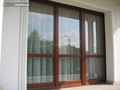 Okna i taras drewniane kolor Kempas ; rolety BeClever